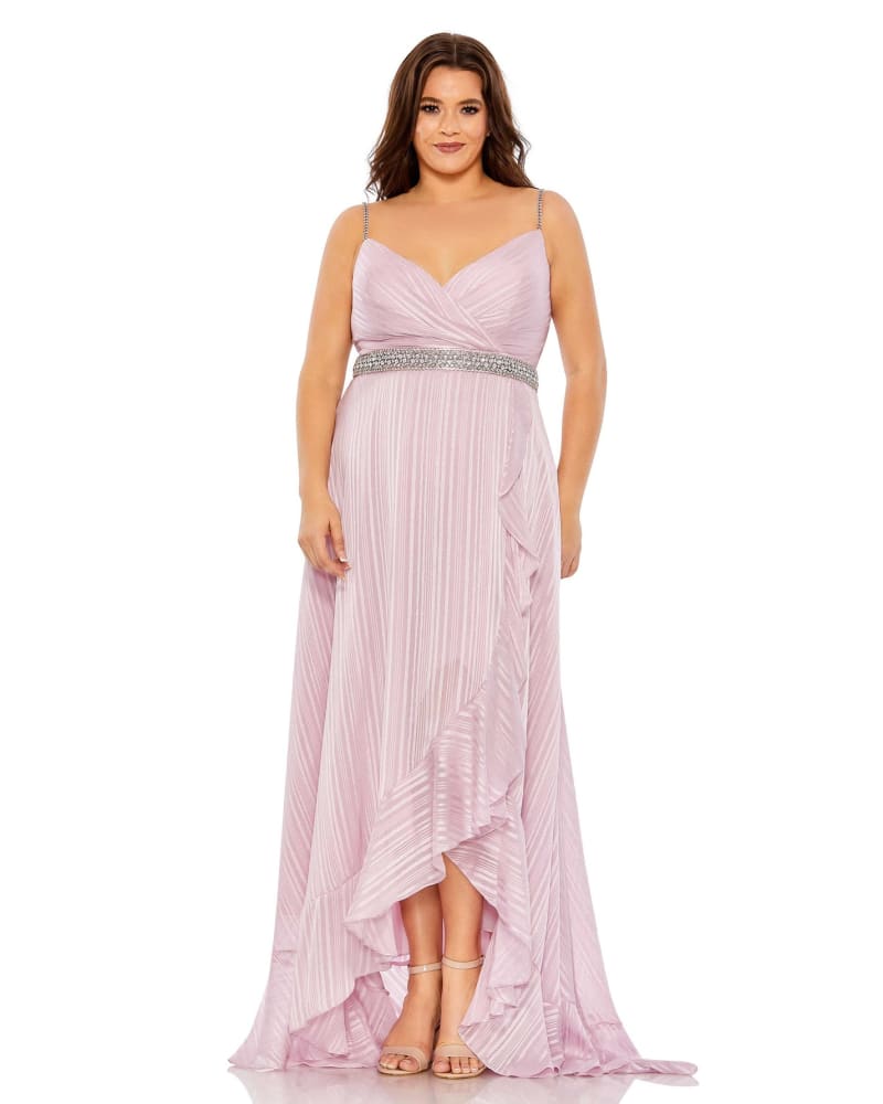 Front of a model wearing a size 14W Rhinestone Belt Faux Wrap Ruffle Tulip Hem Gown in Rose by Mac Duggal. | dia_product_style_image_id:290012